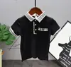Fornecedor de micro-roupas infantis verão 2019 nova camiseta versátil de cor sólida com lapela C78029 calça A70041