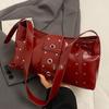 Bolso de Mujer de Textura de Alta Gama Transfronterizo 2025 Nuevo Diseño Nicho de Remaches Bolso de Hombro Tipo Cartera Bolso Dumpling