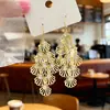 Pendientes de Concha Calada con Borla de Hoja 2025 Nuevos de Moda Elegantes de Nicho Simples Exagerados