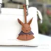 Nova Bolsa Pingente de Boneca Coelho Fofo de Circo em Couro Ins Decoração Pendente para Espelho Retrovisor de Carro Coelho Feio Personalizado