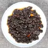 Venta al por mayor Té Pu'er Muzhi cabeza de té plateada rota "cabeza de té vieja" Té Pu'er cocido tetera pequeña Té Pu'er