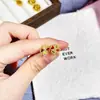 Loja de Ouro Mesmo Estilo Ouro Areia Gelo Triturado Brilhante Riqueza Instantânea Brincos de Moeda de Cobre para Mulheres Temperamento de Alta Classe Brincos de Ouro de Imitação