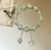 Pulsera de Cristal Verde Estilo Bosque Mariposa Media Pulsera Rígida para Hombres y Mujeres, Moderna y Elegante, Realza el Cutis, Regalo de Cristal para Mejores Amigos y Accesorios