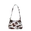 Bolsas Modernas Transfronteiriças Femininas Outono 2026 Nova Textura de Leite Textura Retrô Bolsa de Ombro Única Bolsa Moderna Bolsa Transversal Mini