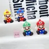 Llavero Colgante de Muñeco Mario Caja Sorpresa Goma Suave Colgante para Llavero de Coche Mario Muñeco para Mochila Escolar Venta al por Mayor