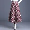 Falda de Invierno 2026 Nueva Falda de Lana Gruesa a Cuadros de Longitud Media de Cintura Alta Falda Acampanada Versátil