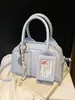 Bolsas de Gama Alta de Nicho Transfronterizas para Mujer 2025 Nuevo Verano Versátil Bolso Cruzado de Moda Portátil Bolso Almohada