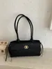 2026 nova moda transfronteiriça bolsa tipo travesseiro simples bolsa de ombro casual coreana para mulheres bolsa de mão com textura de luxo leve