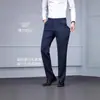 Pantalones casuales elásticos, lisos, resistentes a las arrugas, sin planchado, de pierna recta y modernos para primavera y otoño, adecuados para papás de mediana edad, traje de negocios versátil y cómodo