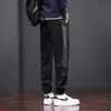 Pantalones casuales de primavera y otoño marca de moda para hombre sueltos atados al tobillo Pantalones deportivos para hombre ropa americana resistente al desgaste de talla grande overol con costuras