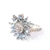 Item Popular Transfronteiriço: Anel de Girassol com Zircônia Azul Clara Incrustada, Anel Feminino Tendência Estilo Europeu e Americano, Atacado do Fabricante Wish