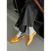 Estilo minimalista cómodas versátiles mules de piel 2026 primavera-verano tacón bajo punta cuadrada zapatillas sin cordones de piel genuina para mujer
