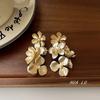 Temperamento exagerado retro flor de metal brincos longos Atmosfera nacional chinesa brincos brincos de nicho feminino atacado