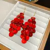 Brincos de Gancho com Franjas em Forma de Concha Europeus e Americanos Transfronteiriços, Brincos Personalizados da Moda Tendência Versáteis com um Design Único para Mulheres