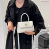 Bolso Pequeño de Tela de Moda Transfronterizo para Mujer 2025 Nuevo Bolso de Hombro Cruzado Vintage Bolso de Mano Versátil Bolso Cuadrado Pequeño de Alto Valor