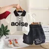 Ropa para Niños Conjunto de Verano para Niños 2026 Nuevo Estilo Camisa Polo de Manga Corta con Letra para Bebé Conjunto de Dos Piezas para Bebé Tendencia