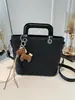 Bolso de cubo de moda con patrón tejido para mujer, nuevo estilo coreano 2026, bolso de mano versátil para salidas diarias y para ir al trabajo, bolso cruzado