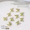 Accesorios para arte de uñas: mariposas de metal en dorado, plateado y blanco K, corbatas de moño, serpentinas tridimensionales estilo japonés, accesorios de decoración de uñas de mariposa