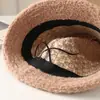 Al por mayor 25 Años Otoño e Invierno Nuevo Sombrero de Pescador Tejido Tela Perro Lazo Mujer Espesado Dulce Protección Auditiva Sombrero de Cubo Sombrero de Cuenca
