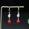 Venta al por mayor del fabricante Exquisitos Pendientes Incrustados de Cinabrio Arena de Mineral Crudo Alto Contenido Arena de Oro Púrpura Pendientes Incrustados de Diamante Chapados en Plata