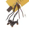 Huayang En Stock Perro Salchicha Colgante Llavero de Perro de Cuero Accesorio Versátil para Bolso Decoración de Coche Festival de Medio Otoño Pequeño Regalo