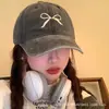Gorra de béisbol con lazo para mujer, nueva moda primavera/verano, gorra de visera versátil bordada, sombrero de protección solar para hombre, casual y versátil