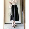 Saia em formato de botão tridimensional estilo Hepburn em tecido de lã com bolsos laterais, saia feminina elegante de comprimento médio para outono e inverno H082409