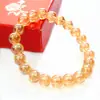 Pulsera de resina de imitación citrino de Brasil de 8 mm de cuentas redondas de un círculo pulsera ámbar dorada transparente joyería al por mayor