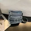 Bolso de mezclilla 2026 nuevo modelo, diseño multicapa, bolso cruzado para mujer, adecuado para ir al trabajo y viajar, bolso de mano simple, transfronterizo