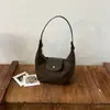 2026 Nuevo Bolso Casual Retro de Hombro para Viajes Diarios Bolso Tipo Dumpling de Gran Capacidad Bolso Cruzado Versátil de Moda