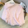 Blusa de tricô rosa suave estilo francês para primavera e outono com flores tridimensionais, mangas compridas com miçangas, gola redonda, top curto que afina e rejuvenesce para mulheres