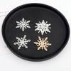 Horquillas para el cabello con copos de nieve decorativos navideños transfronterizos, accesorios para el cabello hechos a mano, accesorios de joyería DIY, copos de nieve en polvo dorado.
