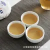Una gran cantidad de té Pu'er de Yunnan al por mayor 2021 té de árbol viejo 100g Pastel pequeño de la Gran Montaña Nevada té crudo té