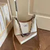 Bolso de hombro de alta gama transfronterizo para mujer, nueva moda 2026, bolso de hombro simple, versátil para el trabajo y el ocio, bolso cruzado