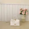 Bolso Pequeño Cuadrado Forma de Caja Primavera para Mujer 2026 Nuevo Estilo Bolso de Mano Rojo Retro Bolso Cruzado para Teléfono de Viaje