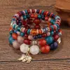 Pulseira de Contas de Vidro Fashion Conjunto de 4 Peças, Estilo Férias, Pingente de Elefante Quente em Venda no Sudeste Asiático, Pulseira Elástica Color-Blocking