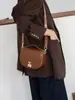 Bolsa Sela Vintage 2025 Nova Tendência Design de Nicho Feminina Transversal Ombro Moda High-End Bolsa Versátil