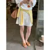 ¡Moda de Viaje Adelgazante Estilo Coreano Guangzhou Ruiyi! Falda Versátil Casual de Color Sólido A-Line de Satén de Acetato para Mujer Verano 2026