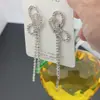 Corea del Sur Dongdaemun Borla de Diamantes Completos Lazo Pin de Plata 925 Aretes de Cara Modificada Aretes Largos Femeninos Súper Hada