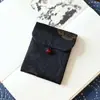 Muestra de pedido final se puede pedir bolsa de tela de brocado para regalo bolsa Wenwan estilo japonés bolsa de almacenamiento de joyas billetera plegable tela