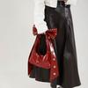 Estilo americano Hot Girl Sweet Cool Style Bow Design Bolsa de ombro com axila Outono e inverno Nova bolsa de mão estilo máquina de rebite