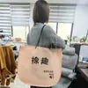 Bolsa No Tejida Logo Impreso Personalizado Bolsa para Ropa Bandolera Tienda de Ropa para Mujer Ecológica Cordón Hebilla Oculta Bolsa de Empaque