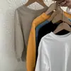 Camiseta de manga comprida para meninos, camisa básica versátil estilo coreano para crianças, top estiloso novo para primavera e outono 2026 para meninas e bebês
