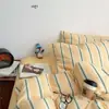 Juego de cuatro piezas de algodón gofrado a rayas 100% algodón funda nórdica sencilla, sábana bajera, sábana encimera juego de cama de tres piezas