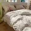 Novo Conjunto de Roupa de Cama de Gaze Amassada de Quatro Peças com Acabamento em Renda e Design Floral, Uso Doméstico Capa de Edredom Duplo e Lençol de Cama Venda por Atacado