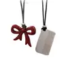 Collar con Lazo Rojo Ankora para Mujer Diseño de Nicho Cadena para Suéter Acero de Titanio de Alta Gama Peine Collar de Cuerda Larga Negra
