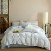 Conjunto de cama jacquard de algodão puro com padrão espinha de peixe tingido no fio, estilo minimalista, quatro peças, lençol e capa de edredom de algodão puro, adequado para todas as estações e lavável à máquina