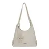 Bolso de axila tejido de nicho transfronterizo para mujer, nuevo modelo 2026, bolso de hombro tipo cubo de gran capacidad, bolso de mano estilo coreano para el trabajo