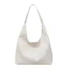 Bolsa feminina retrô de grande capacidade 2026 moda tendência nova bolsa de ombro simples padrão trançado bolsa tote casual para o dia a dia