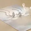 Brinco de pressão de camada dupla com zircônia, popular no TikTok, estilo doce e cool, corrente longa com franjas e strass, clipe de osso de orelha sem furo